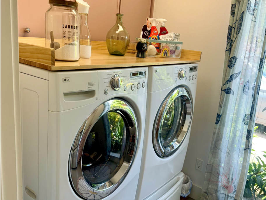 HeyCody Washer Dryer shelf on top and washer and dryer in laundry room
