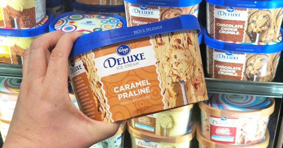 hand holding a tub of Kroger Ice Cream in store