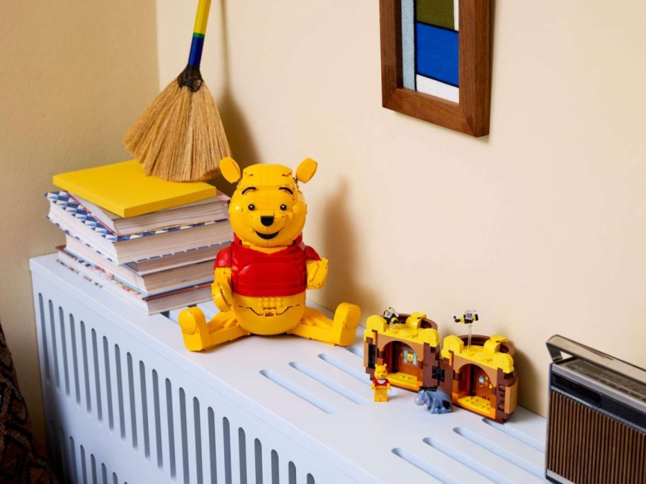 A complete LEGO Winnie the Pooh set on a shelf.