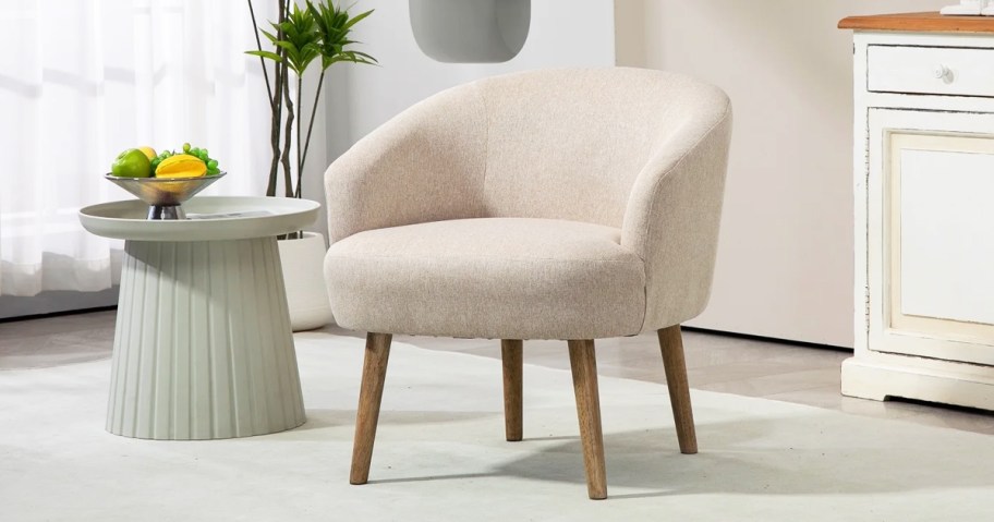beige upholstered accent chair