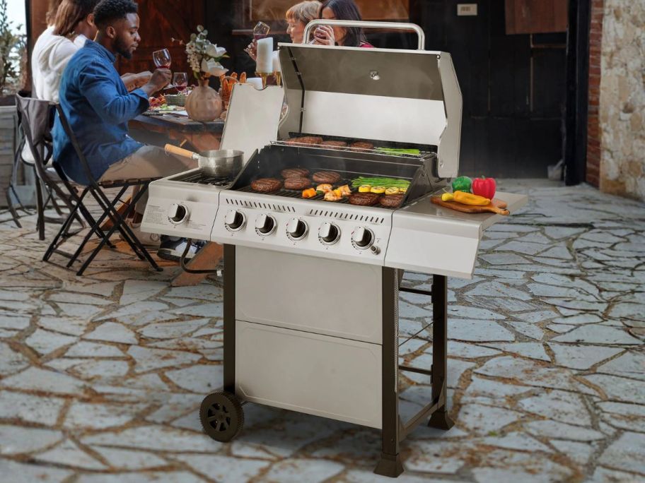 Royal Gourmet Stainless Steel 5-Burner Liquid Propane Gas Grill on patio