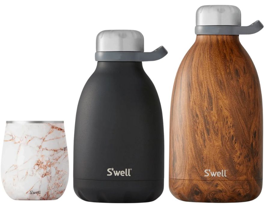 a wine tumbler and two bottles