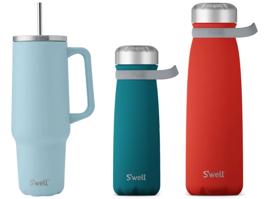 A larger blue tumbler and two other water bottles with caps