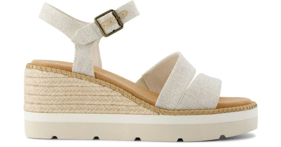 A tan and white platform sandal