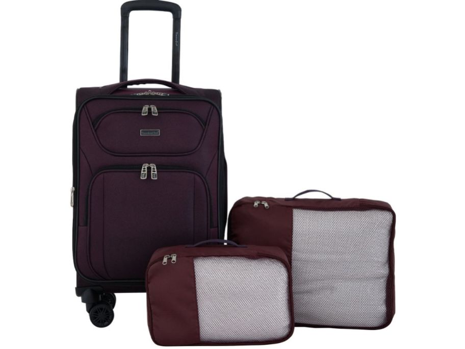A Travelers Club Soft Side Suitcase with two packing cubes
