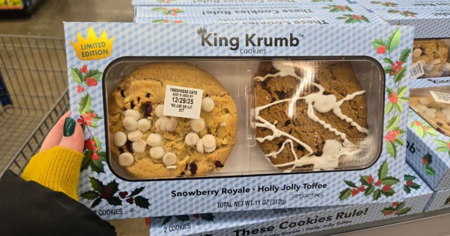 A person holding a box of Walmart King Krumb Cookies
