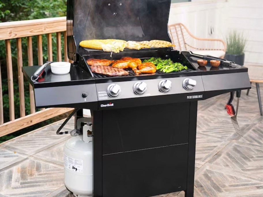 black and silver grill with food cooking inside