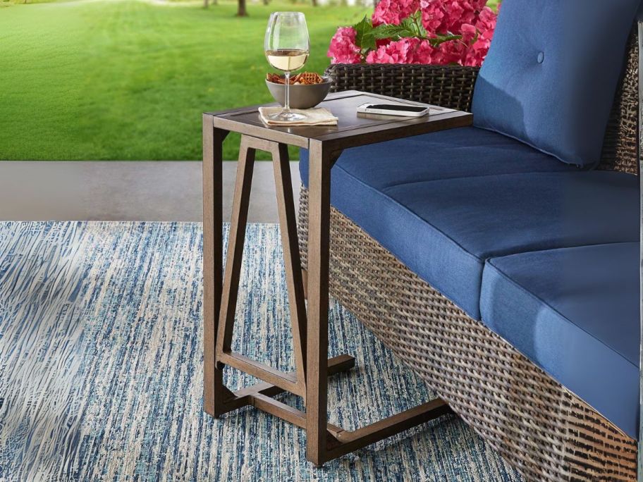 U-Shaped Side Table next to couch on patio