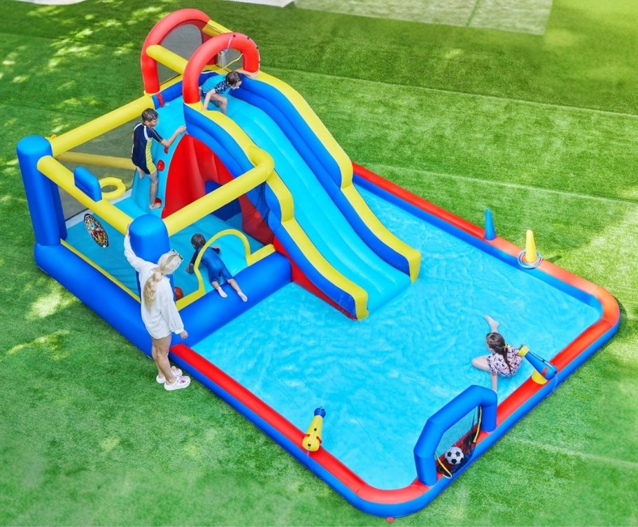 a 10 in 1 inflatable water park in a backyard