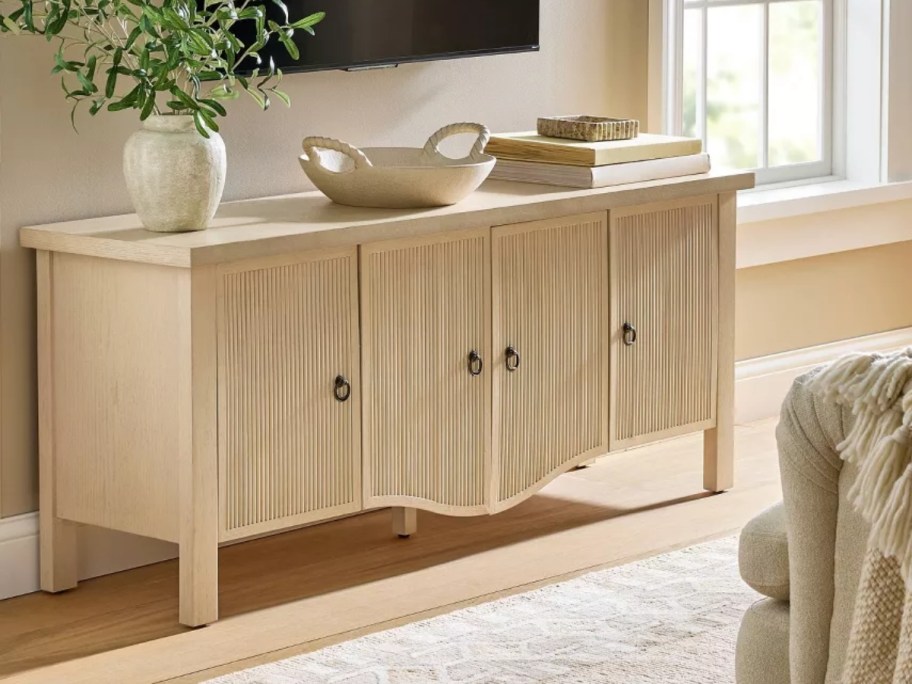 a natural wood large media cabinet / tv stand