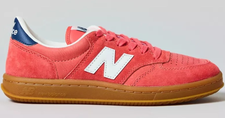 an orange New Balance shoe