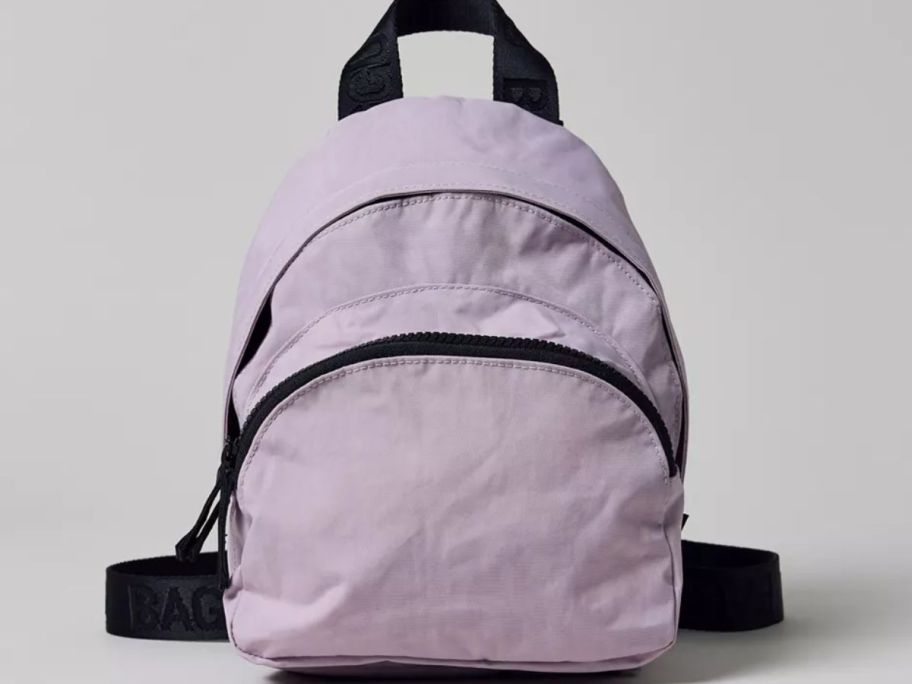 a light purple mini backpack