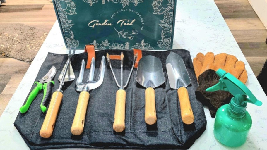 a gardening tool set on display on a table top