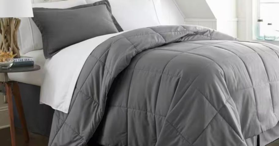 gray Becky Cameron Performance Comforter Set on bed