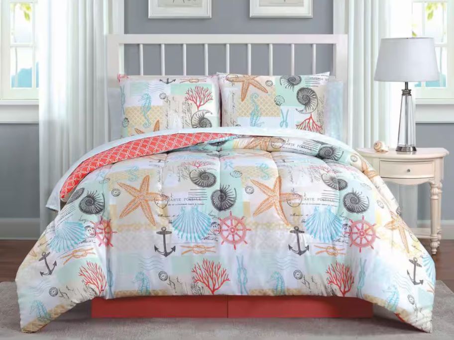 Belize 8-Piece Coral Queen Comforter Set on bed