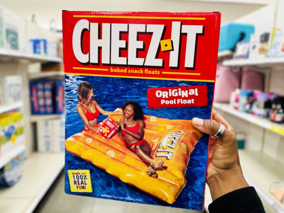 hand holding a Cheez-It Pool Float box in store