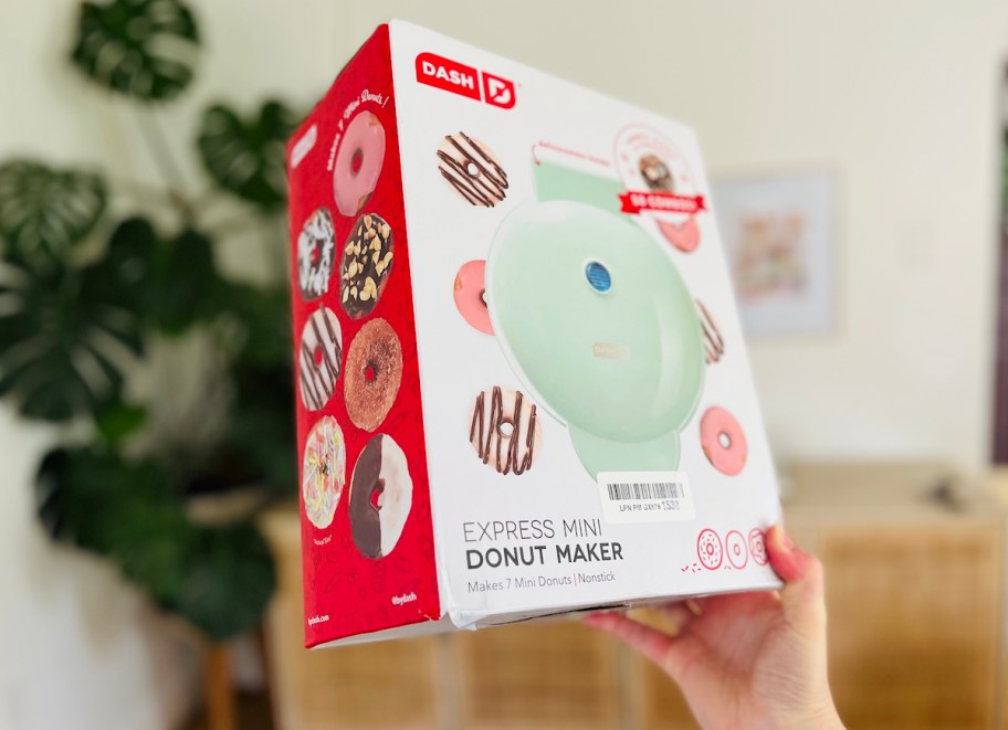 hand holding a box with Dash Mini Donut Maker