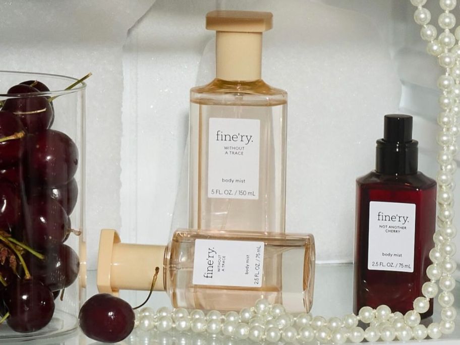 Bottles of Fine'ry Without a Trace fragrances on a shelf