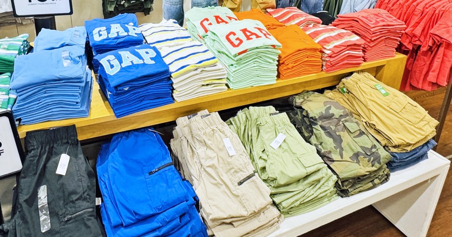 display tables of GAP shirts and pants