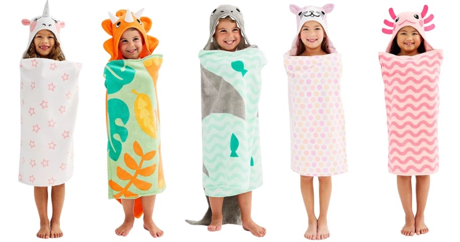 kids in different animal hooded bath towels