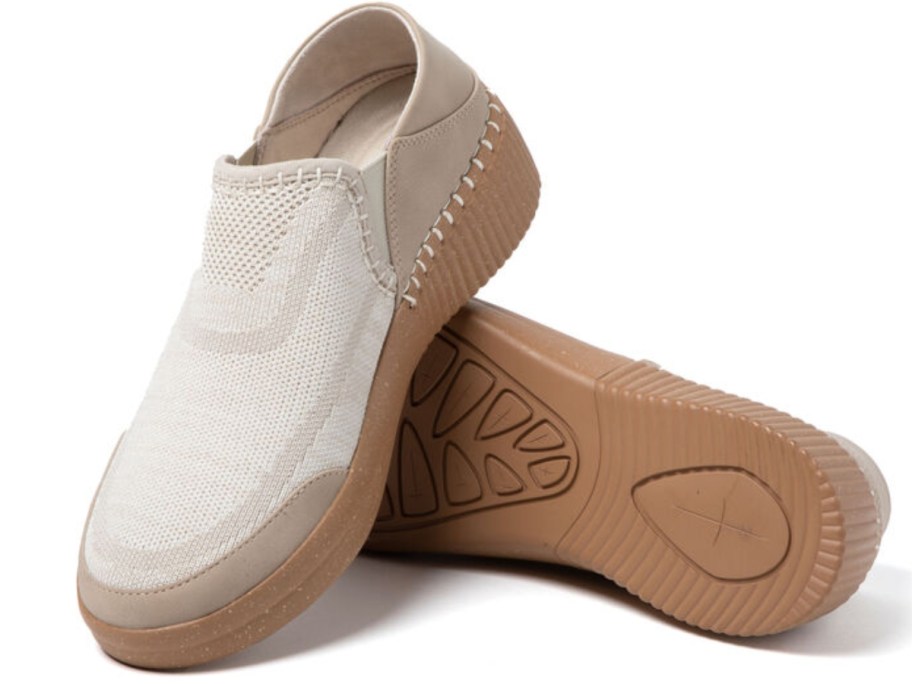 a pair of women's tan slip in sneakers