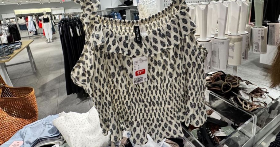 An H&M clearance Tank top on a hanger