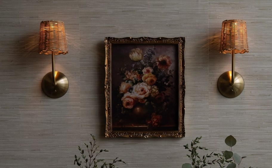 rattan scalloped wall sconces with floral picture frame