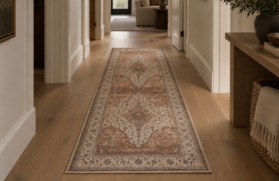 persian rug in hallway with oak floors