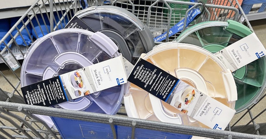 grey, green, purple, and white snackle boxes in a shopping cart