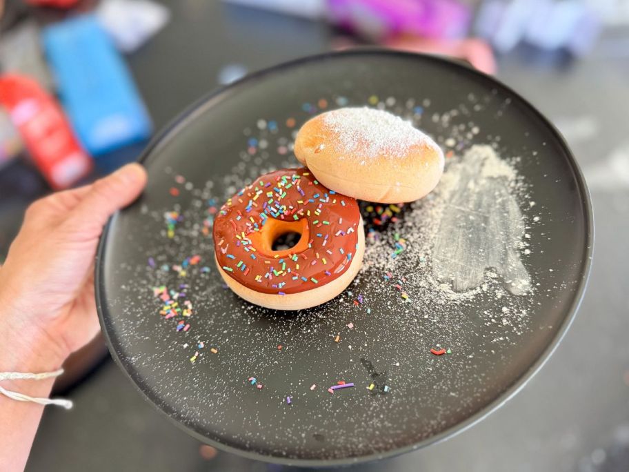 A plate with two Slime Life Donuts