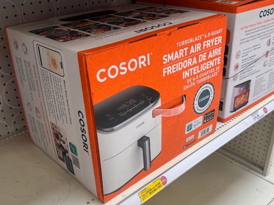A Cosori TurboBlaze Smart 6-Quart Air Fryer on a Target store shelf with a 50% off clearance tag