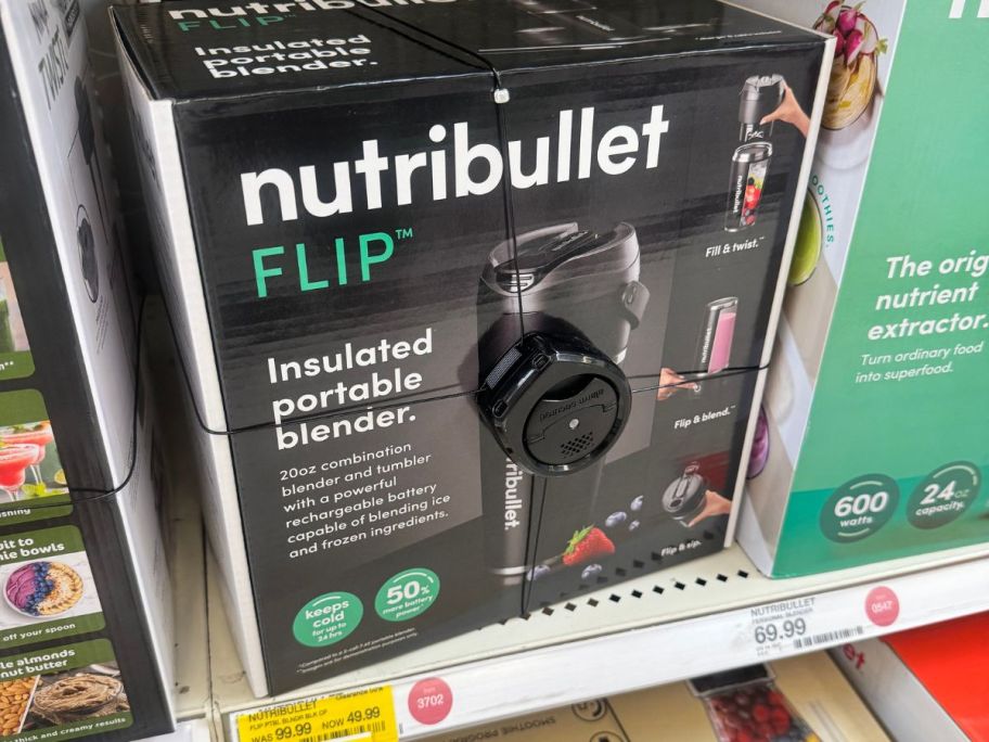 A NutriBullet Flip Portable Blender on the shelf at Target with a 50% off clearance tag