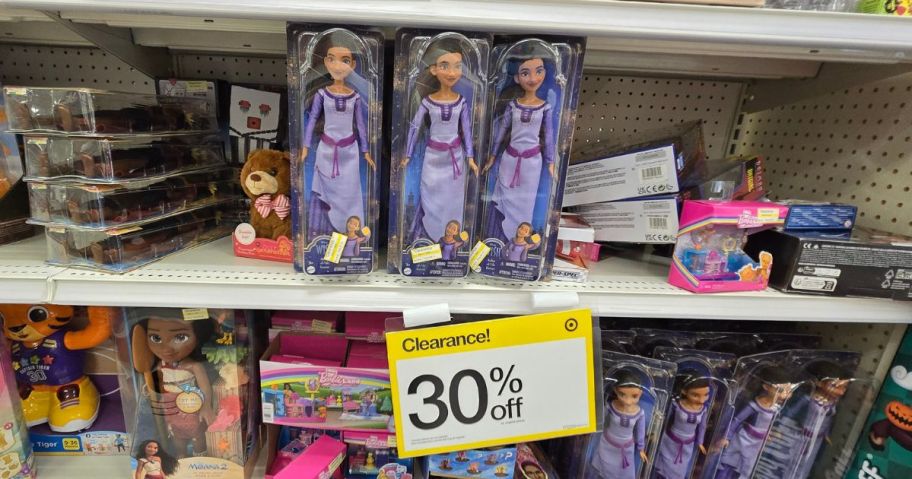 Shelf of clearance toys at Target with a sign for 30% off