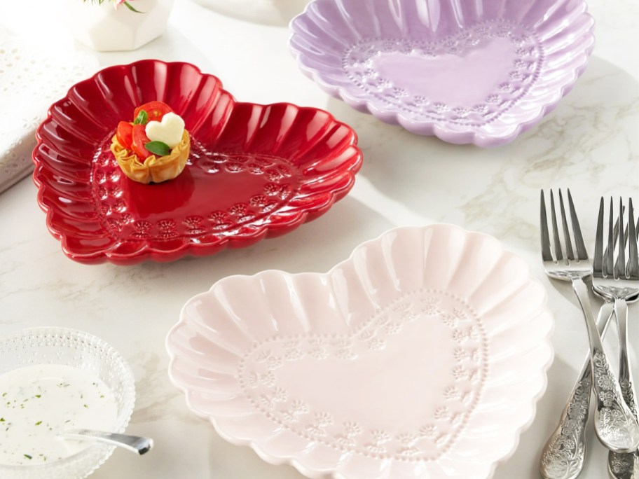 scalloped heart shaped plates on a table