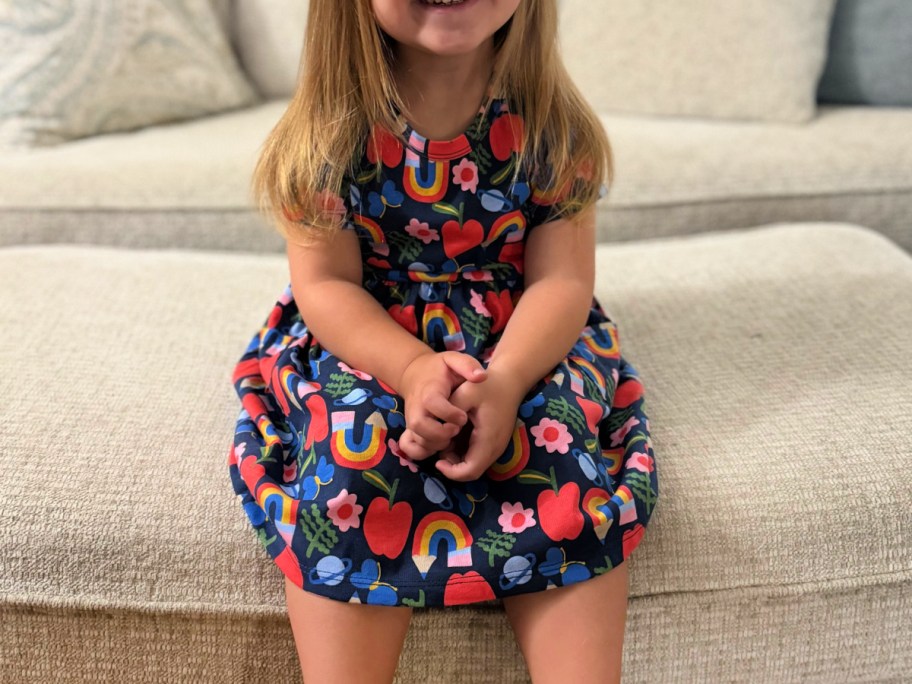 Little girl wearing school themed wonder nation dress