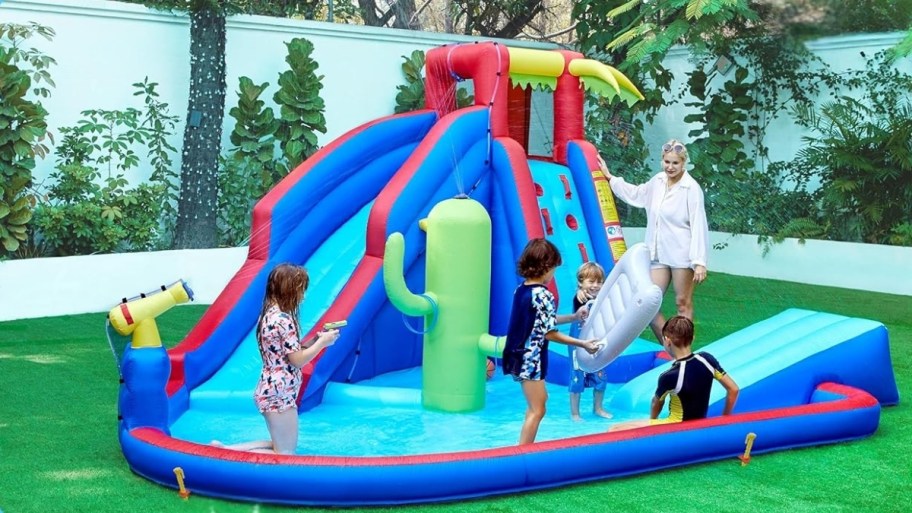 an island themed inflatable water slide