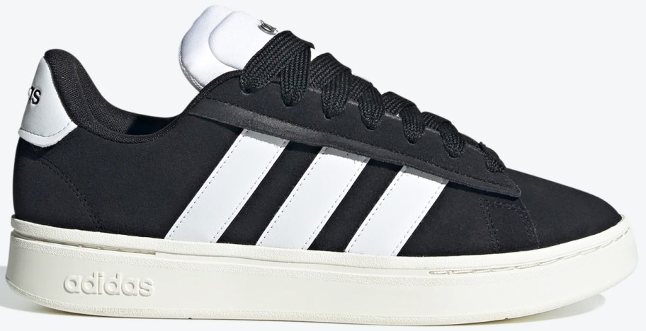black sneakers with white stripes