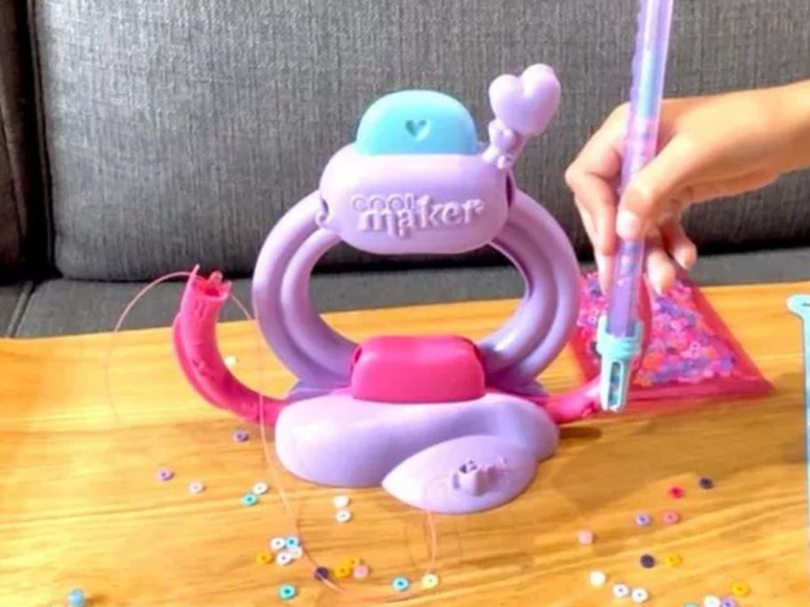 Cool Maker Stack'd Heishi Bracelet Studio Jewelry Making Kit on table