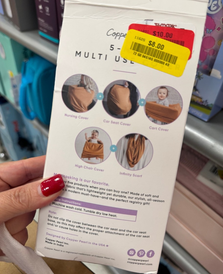 womans hand holding a baby wrap