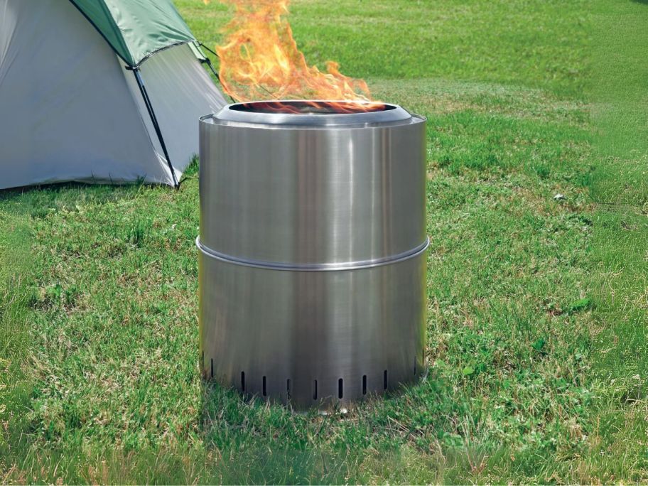 Ozark Trail 15" Collapsible Stainless Steel Smokeless Fire Pit on grass