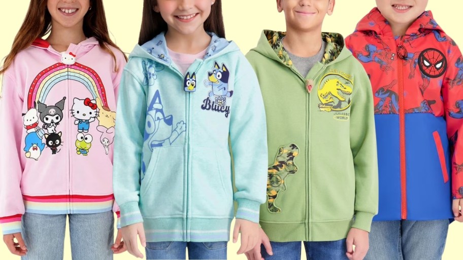 four kids wearing character jackets