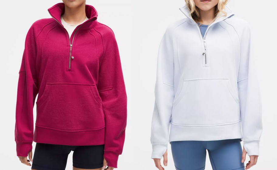 two women in dark pink and light blue half zip sweatshirts