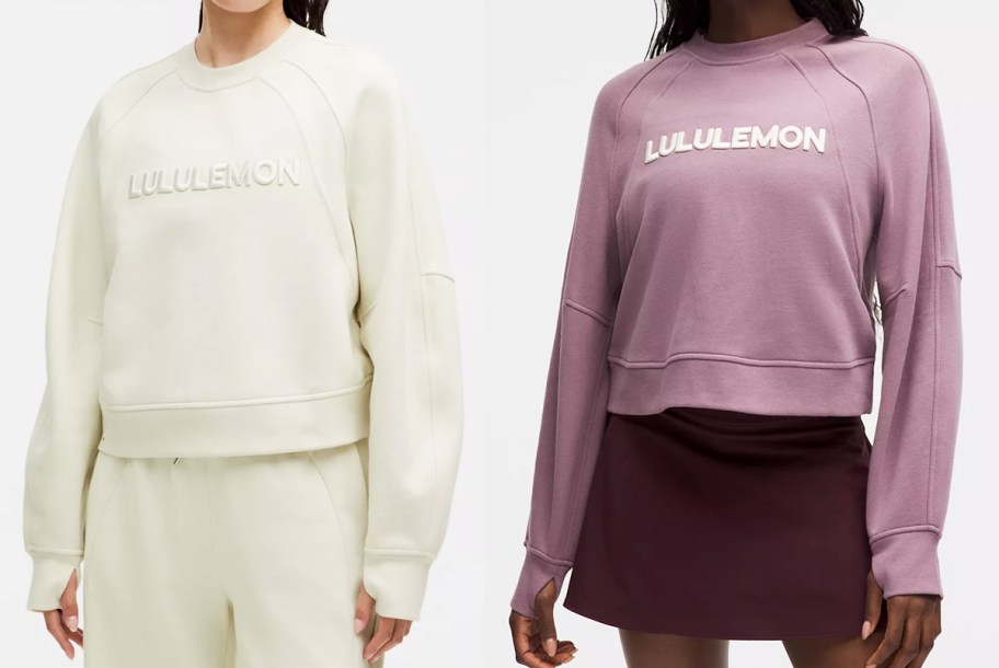 two women in white and pink sweatshirts that say lululemon on the front