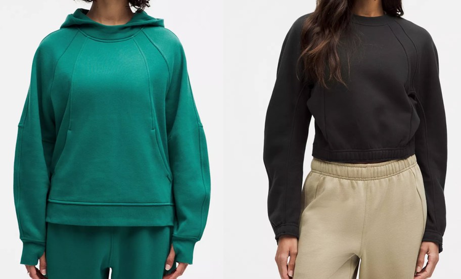 two women in green and black sweatshirts