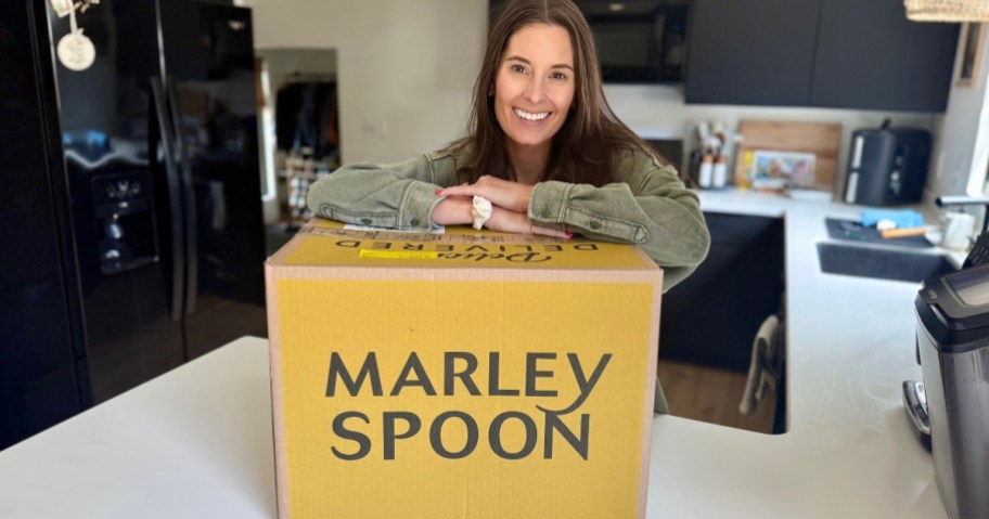 a woman with a marley spoon box