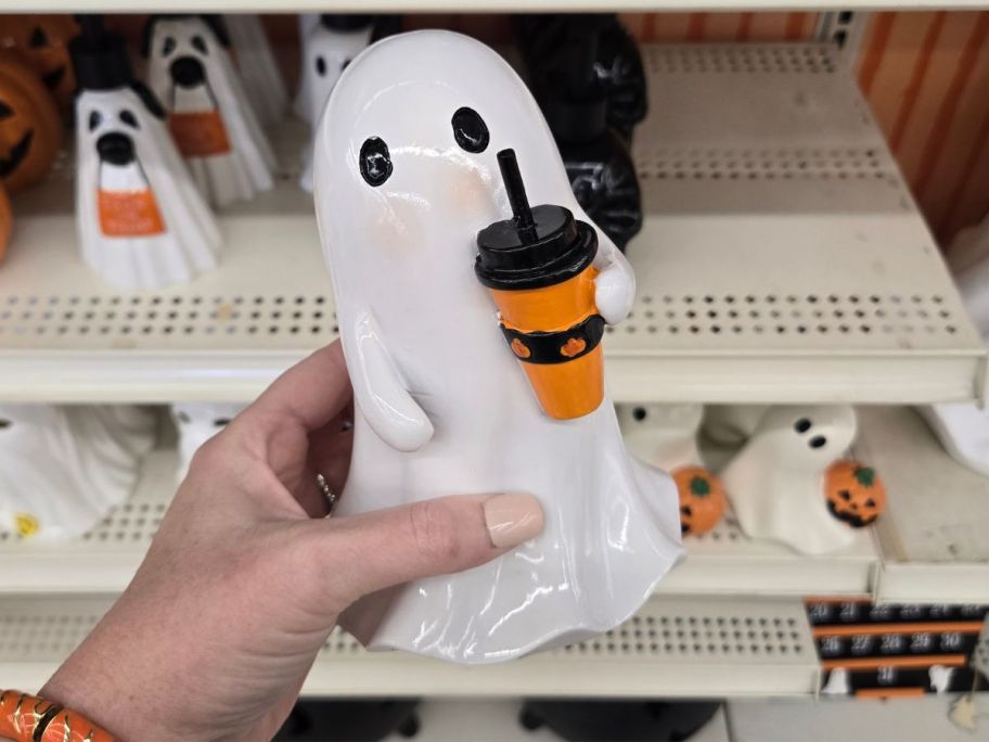 Ghost w/ Travel Cup Tabletop Decor in hand in store