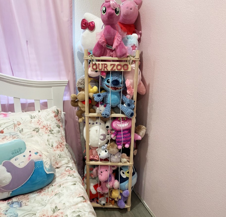 stuffed animals in storage bin