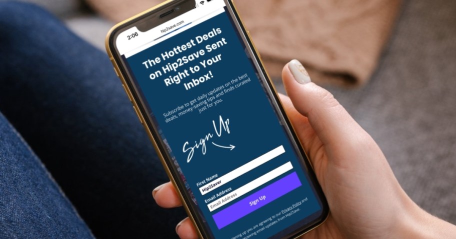 hand holding phone with newsletter sign up