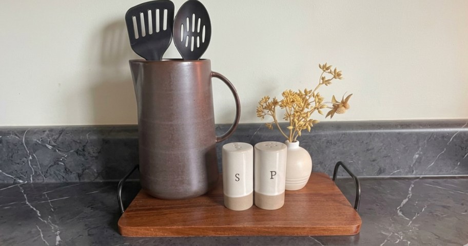 wooden tray with kitchen items on top