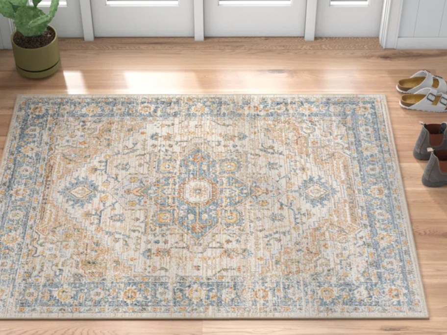 light blue and orange oriental area rug
